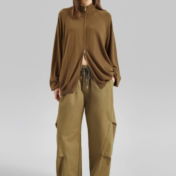 The Frankie Shop Tulsa Curved Pants - Dark Olive - Oversized Minimalist Pants in Green - Shop at Coveti