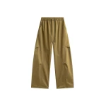 The Frankie Shop Tulsa Curved Pants - Dark Olive - Oversized Minimalist Pants in Green - Shop at Coveti