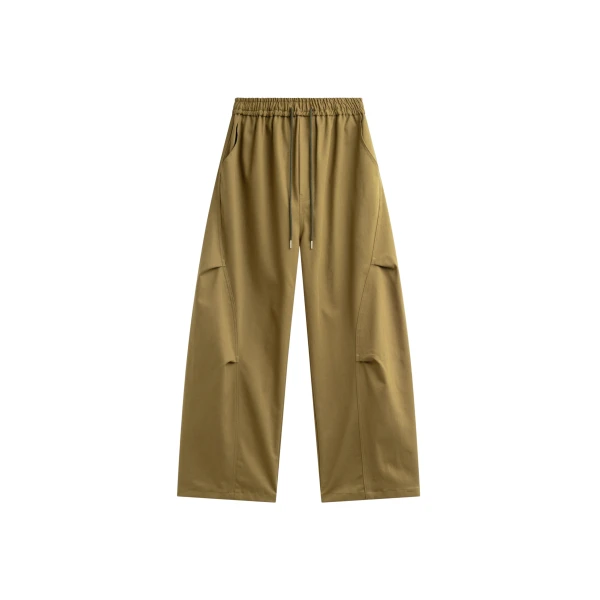 The Frankie Shop Tulsa Curved Pants - Dark Olive - Oversized Minimalist Pants in Green - Shop at Coveti