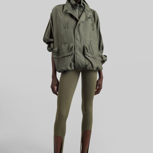 The Frankie Shop Twilla Stirrup Leggings - Olive - Oversized Minimalist Pants in Green - Shop at Coveti