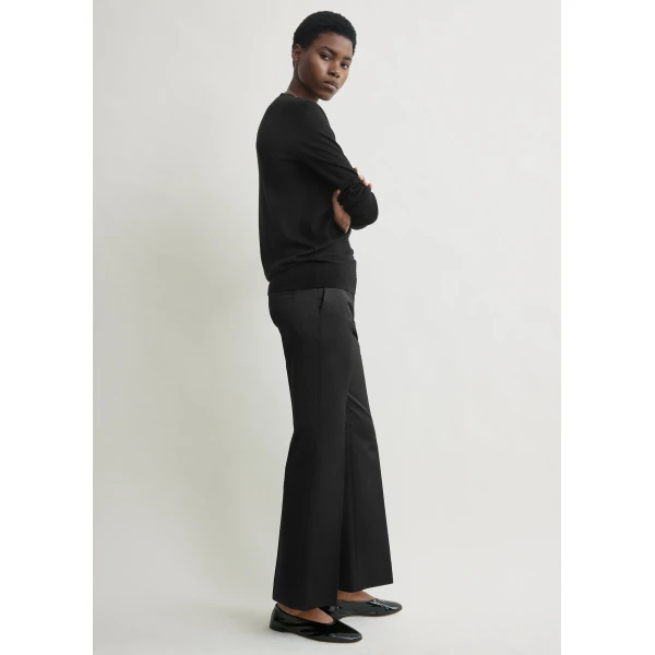 Totême Kick Flare Raw-Edge Trousers Black - Pants - Scandinavian Minimalist Luxury at Coveti