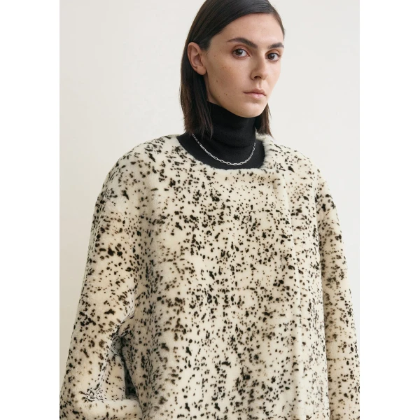 Totême Stracciatella Shearling Coat Black/White - Coats - Scandinavian Minimalist Luxury at Coveti