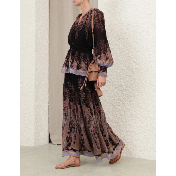 Elevate your elegance in this Zimmermann Tops available now at Coveti