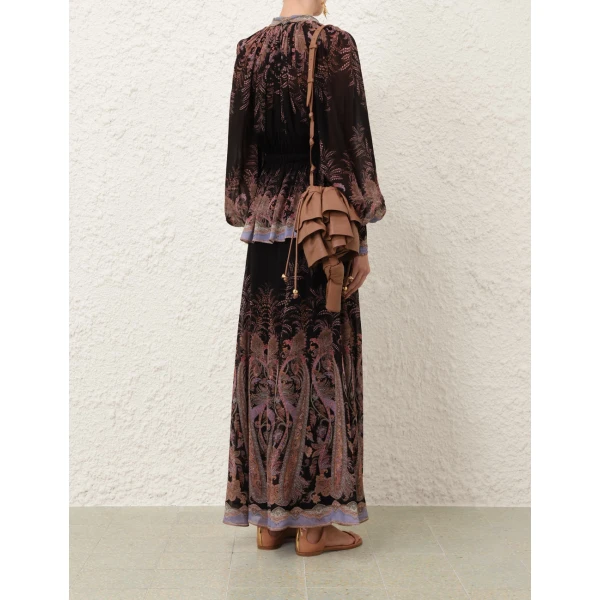 Elevate your elegance in this Zimmermann Tops available now at Coveti