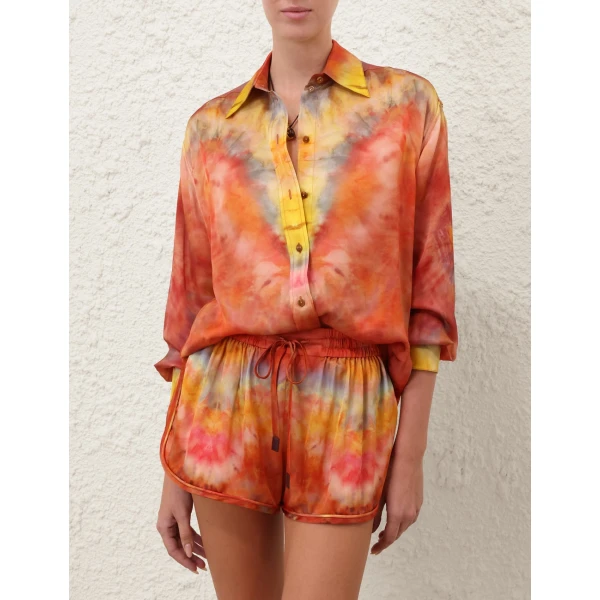 Elevate your elegance in this Zimmermann Tops available now at Coveti
