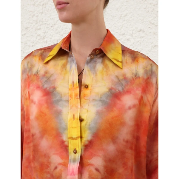 Elevate your elegance in this Zimmermann Tops available now at Coveti