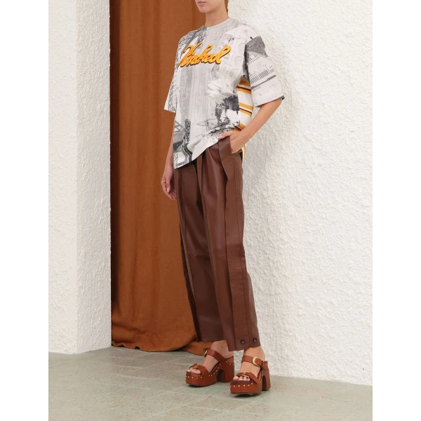 Elevate your elegance in this Zimmermann Tops available now at Coveti