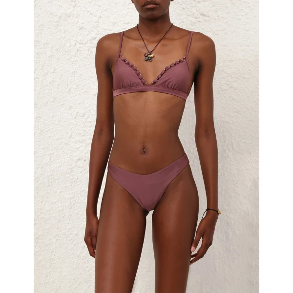 Elevate your elegance in this Zimmermann Bikini available now at Coveti