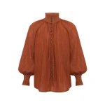 Elevate your elegance in this Zimmermann Tops available now at Coveti