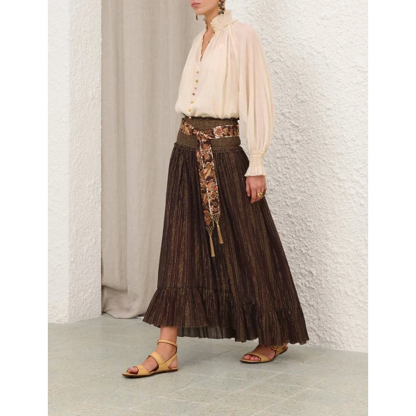 Elevate your elegance in this Zimmermann Tops available now at Coveti
