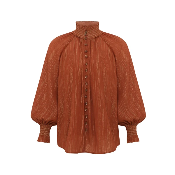 Elevate your elegance in this Zimmermann Tops available now at Coveti