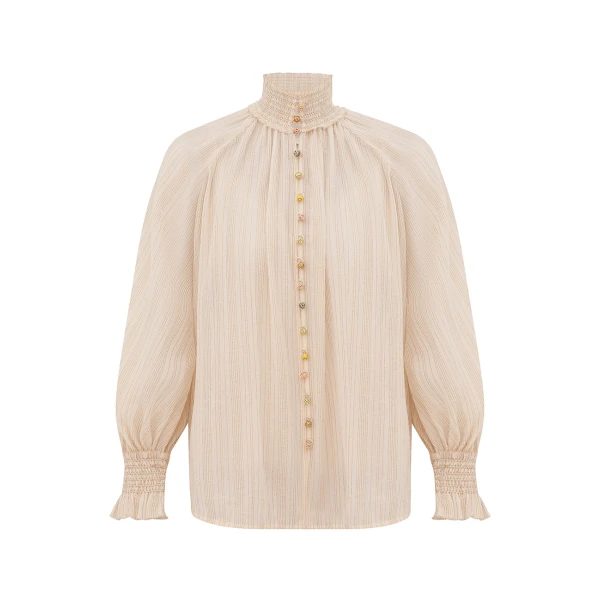 Elevate your elegance in this Zimmermann Tops available now at Coveti