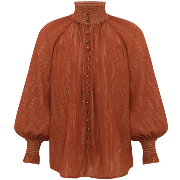 Elevate your elegance in this Zimmermann Tops available now at Coveti
