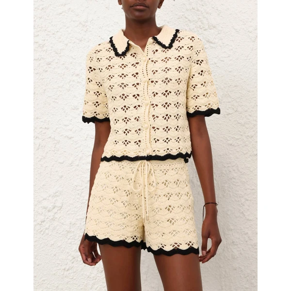 Elevate your elegance in this Zimmermann Tops available now at Coveti