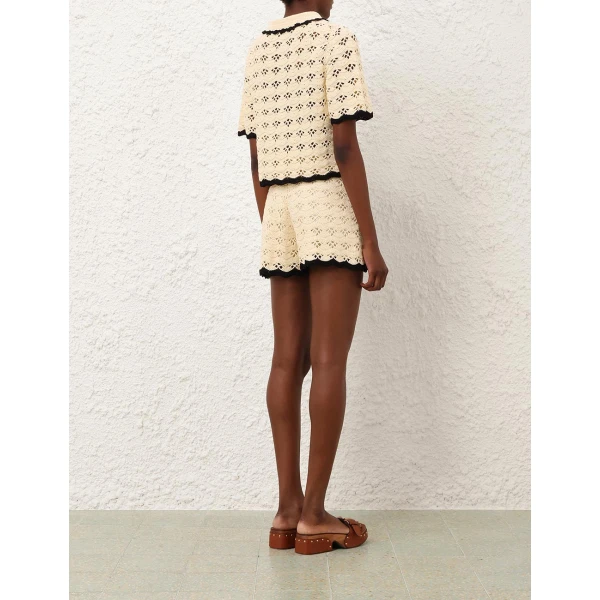Elevate your elegance in this Zimmermann Tops available now at Coveti