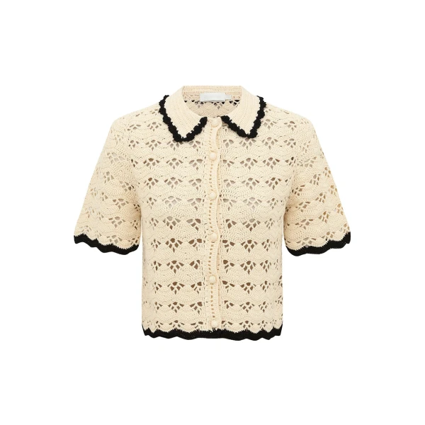 Elevate your elegance in this Zimmermann Tops available now at Coveti