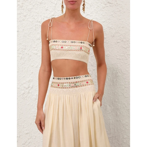 Elevate your elegance in this Zimmermann Tops available now at Coveti