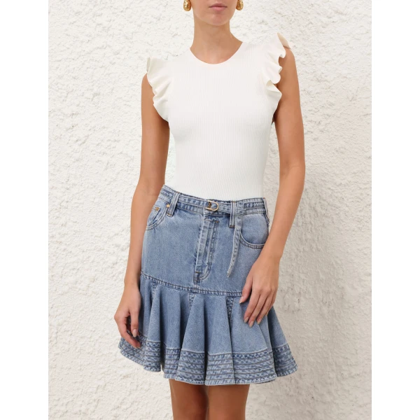 Elevate your elegance in this Zimmermann Tops available now at Coveti