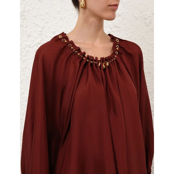 Elevate your elegance in this Zimmermann Tops available now at Coveti