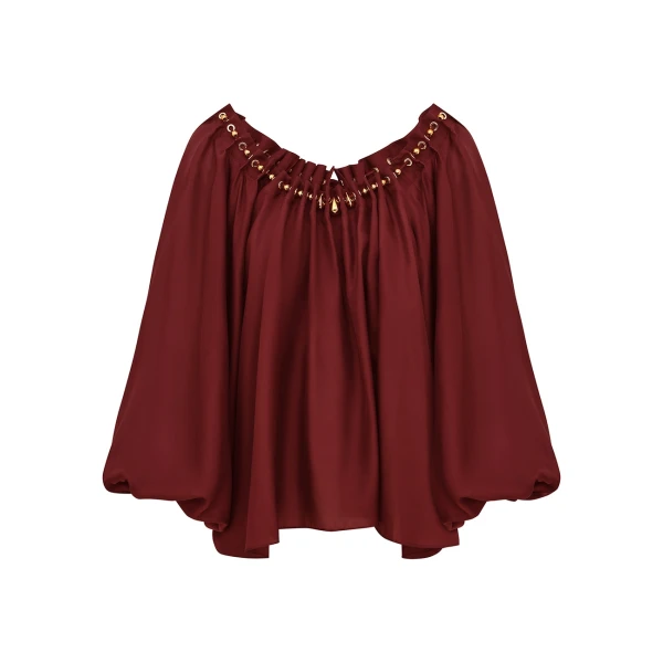 Elevate your elegance in this Zimmermann Tops available now at Coveti