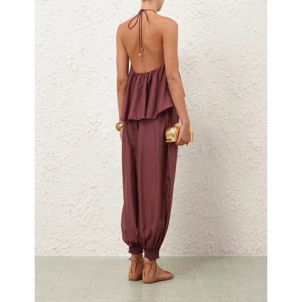 Elevate your elegance in this Zimmermann Tops available now at Coveti