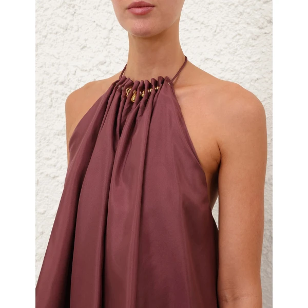 Elevate your elegance in this Zimmermann Tops available now at Coveti