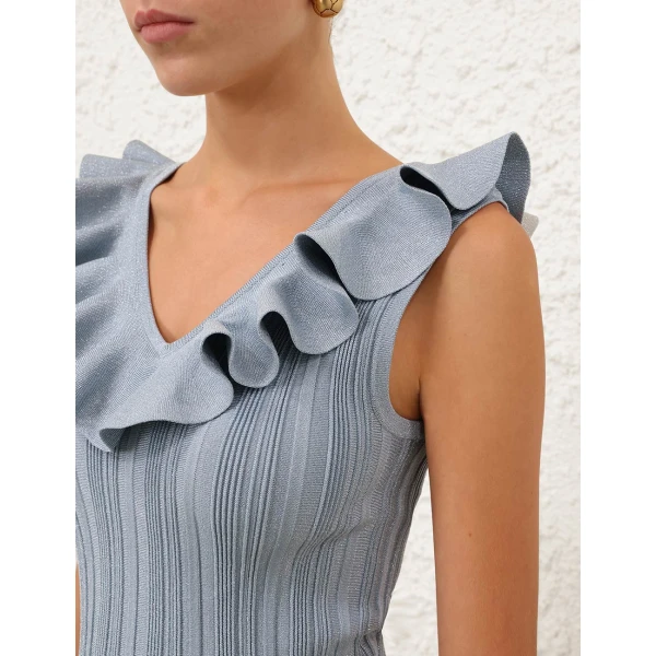 Elevate your elegance in this Zimmermann Tops available now at Coveti