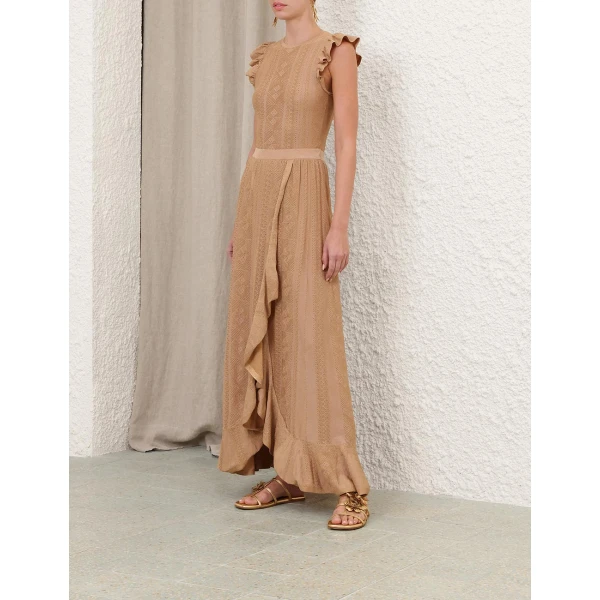 Elevate your elegance in this Zimmermann Tops available now at Coveti