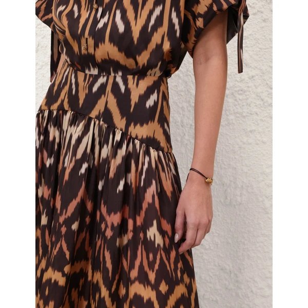 Elevate your elegance in this Zimmermann Skirts available now at Coveti