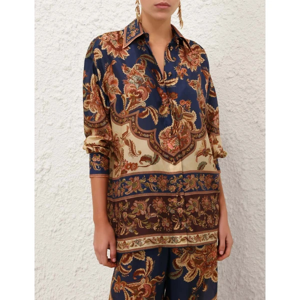 Elevate your elegance in this Zimmermann Tops available now at Coveti