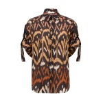 Elevate your elegance in this Zimmermann Tops available now at Coveti