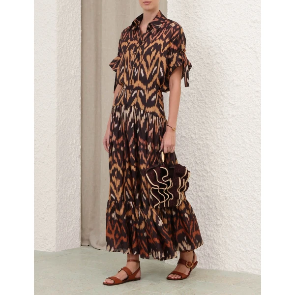 Elevate your elegance in this Zimmermann Tops available now at Coveti