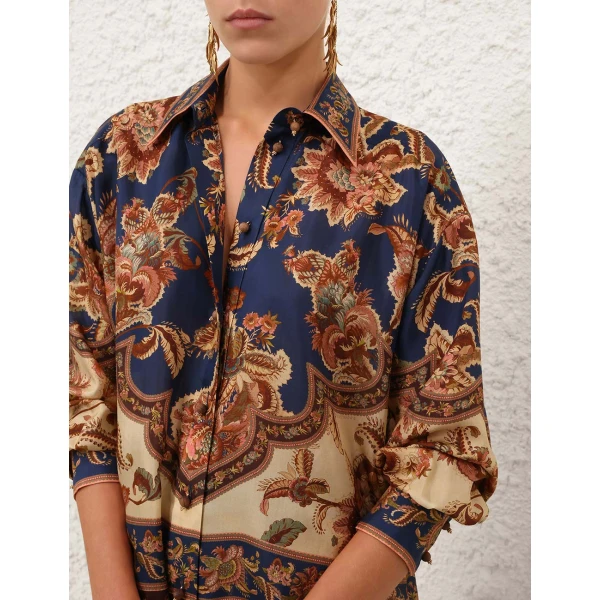 Elevate your elegance in this Zimmermann Tops available now at Coveti
