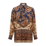 Elevate your elegance in this Zimmermann Tops available now at Coveti