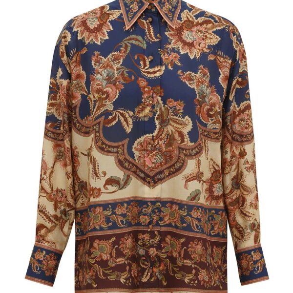 Elevate your elegance in this Zimmermann Tops available now at Coveti
