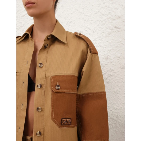Elevate your elegance in this Zimmermann Tops available now at Coveti