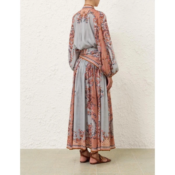 Elevate your elegance in this Zimmermann Tops available now at Coveti
