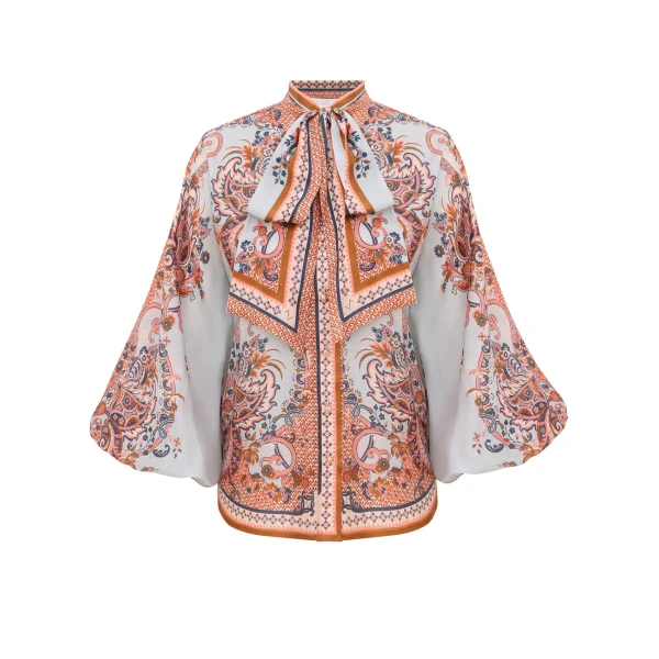 Elevate your elegance in this Zimmermann Tops available now at Coveti
