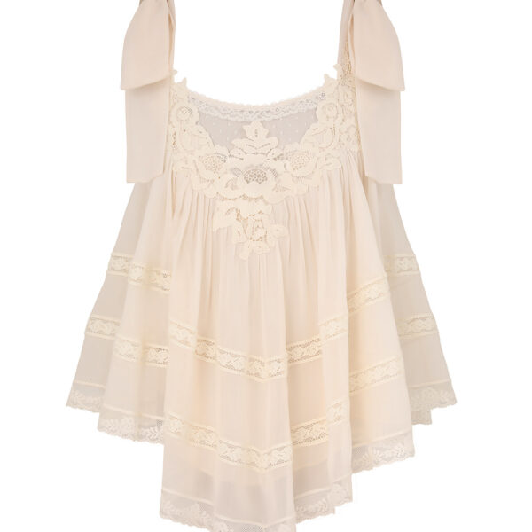 Elevate your elegance in this Zimmermann Tops available now at Coveti