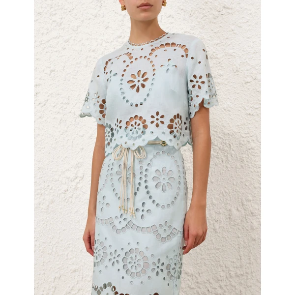Elevate your elegance in this Zimmermann Tops available now at Coveti