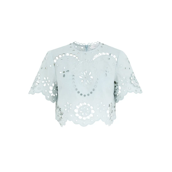 Elevate your elegance in this Zimmermann Tops available now at Coveti