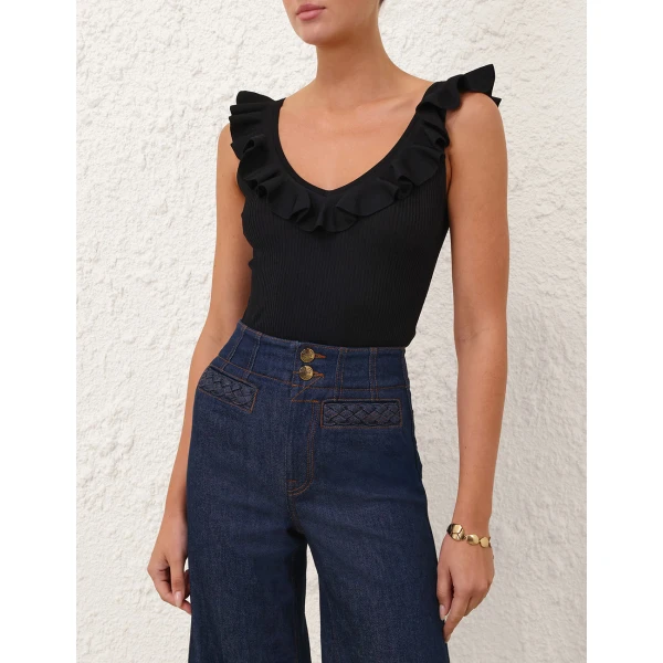 Elevate your elegance in this Zimmermann Tops available now at Coveti