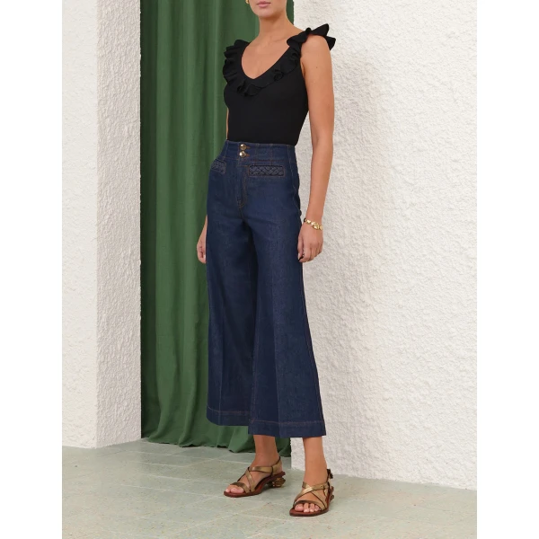 Elevate your elegance in this Zimmermann Tops available now at Coveti
