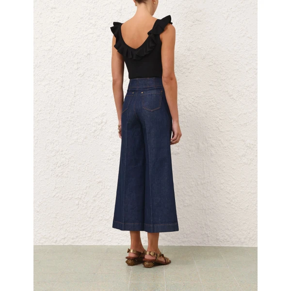 Elevate your elegance in this Zimmermann Tops available now at Coveti