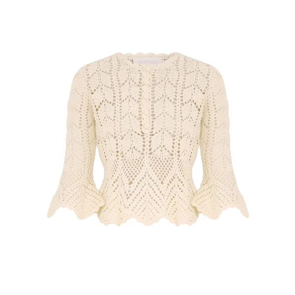 Elevate your elegance in this Zimmermann Tops available now at Coveti