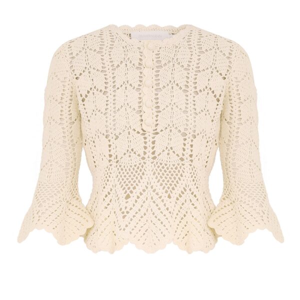Elevate your elegance in this Zimmermann Tops available now at Coveti