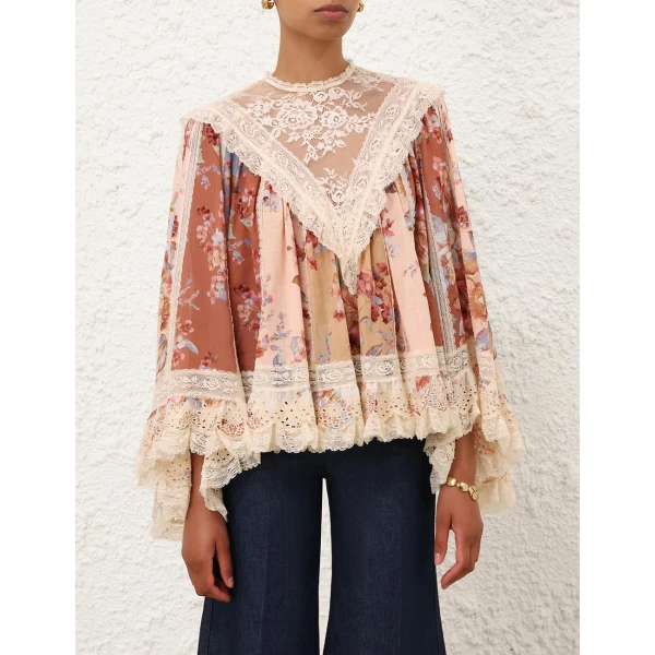 Elevate your elegance in this Zimmermann Tops available now at Coveti