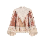 Elevate your elegance in this Zimmermann Tops available now at Coveti