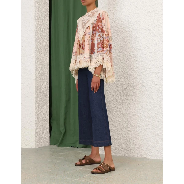 Elevate your elegance in this Zimmermann Tops available now at Coveti