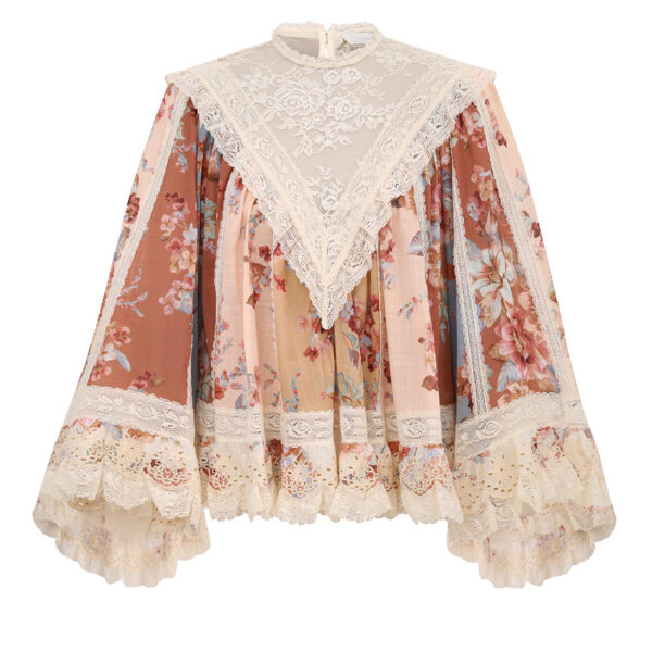 Elevate your elegance in this Zimmermann Tops available now at Coveti